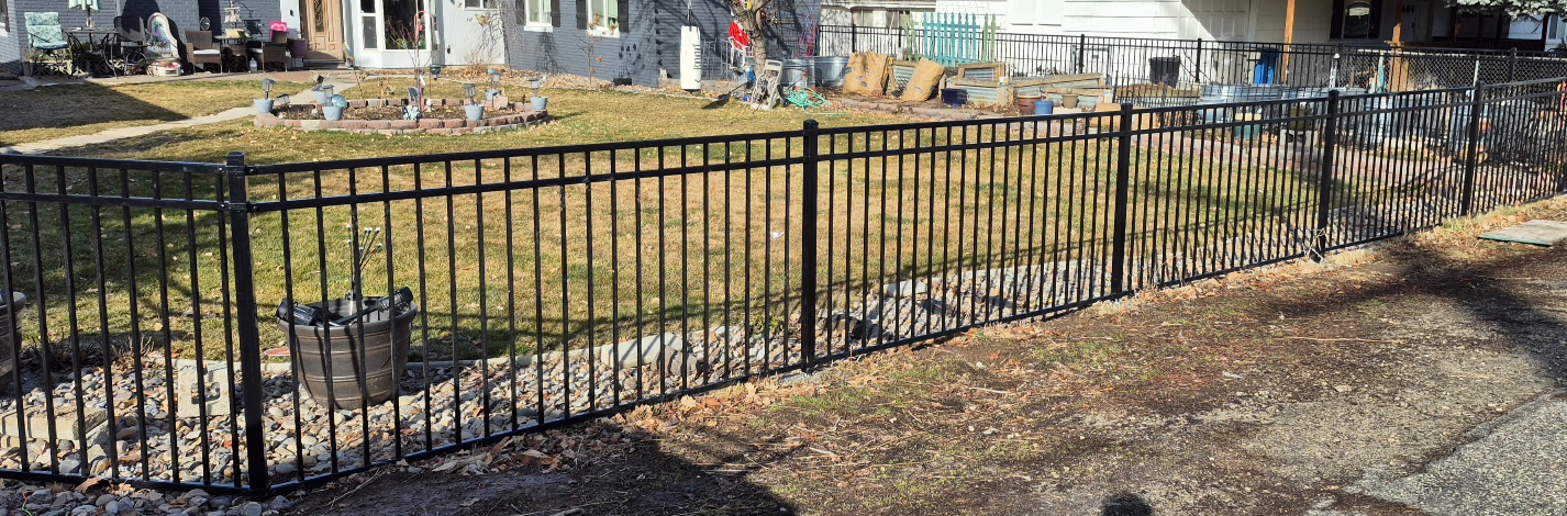Black ornamental iron fence by Fence Craft