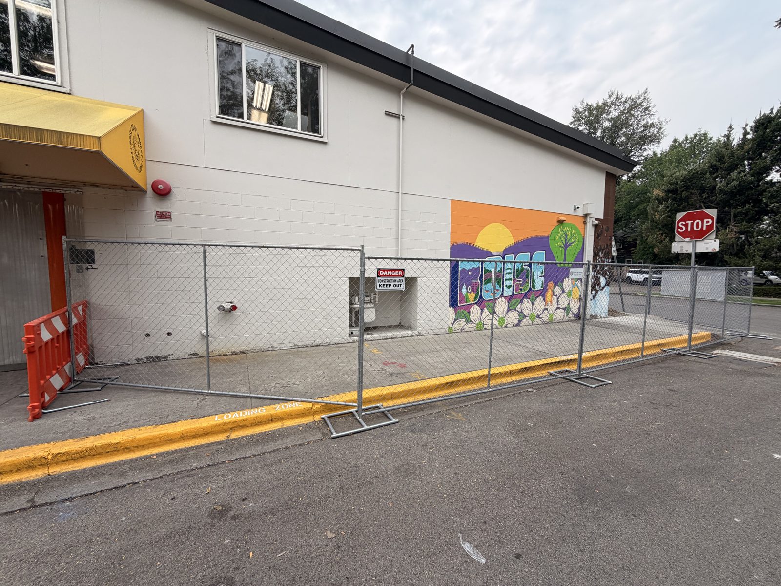 Temporary fence with sidewalk closure